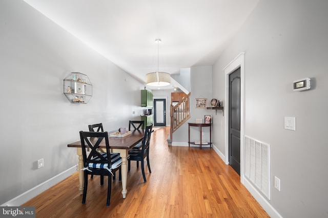 dining room featuring hardwood / wood-style flooring