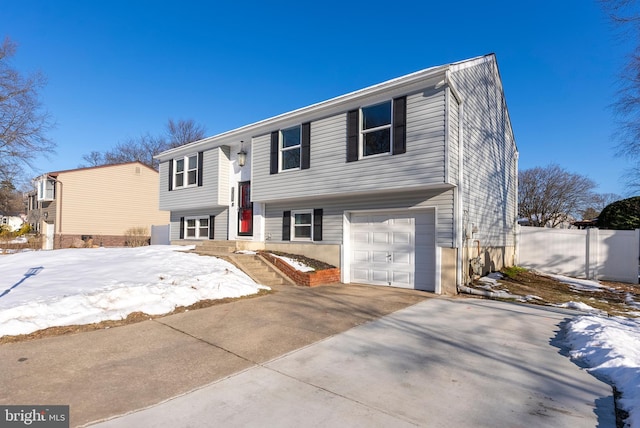 bi-level home featuring a garage