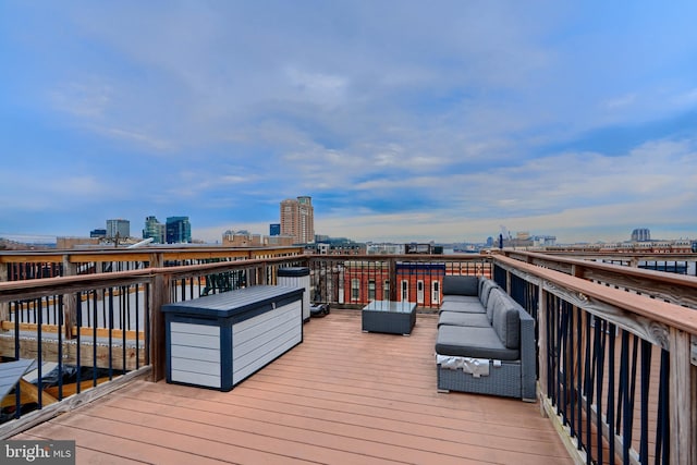 deck featuring a view of city