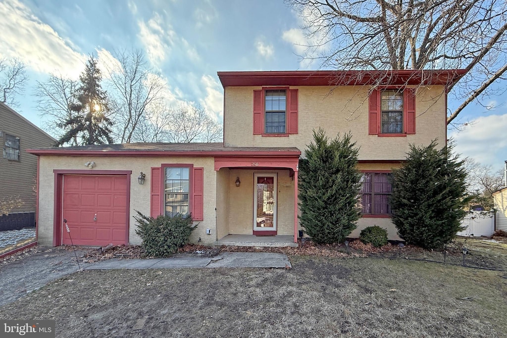 view of property featuring a garage