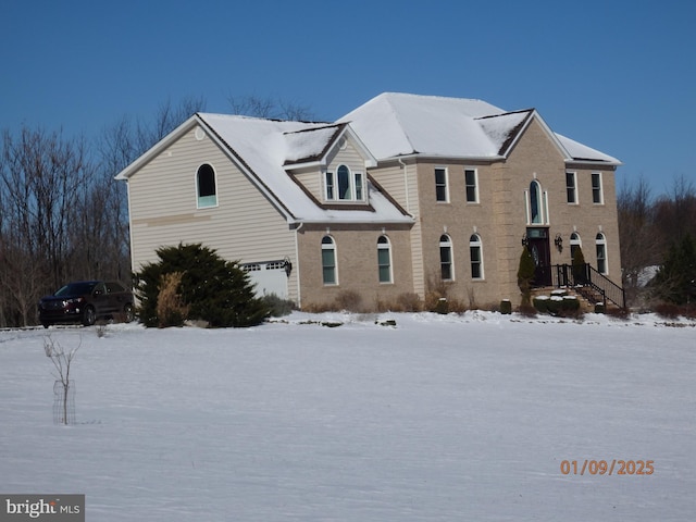 front of property featuring a garage