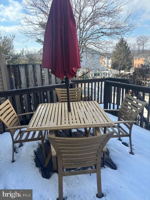 view of snow covered deck