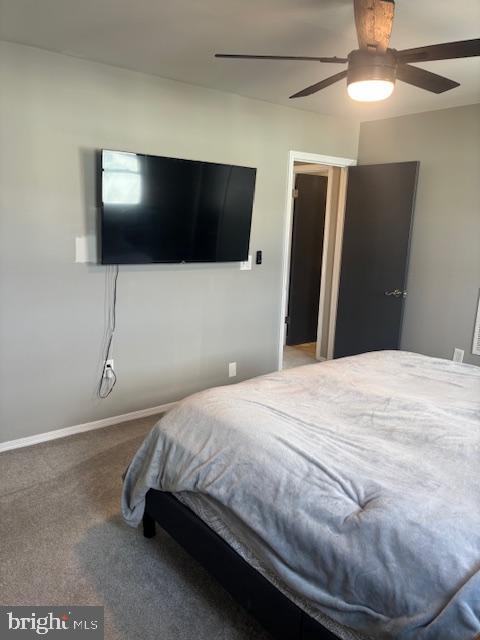 bedroom featuring ceiling fan and carpet flooring