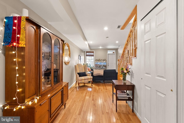 hallway featuring light hardwood / wood-style flooring