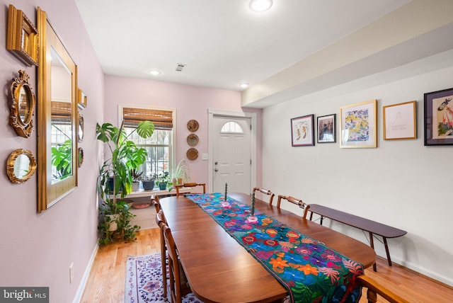 dining room with light hardwood / wood-style floors