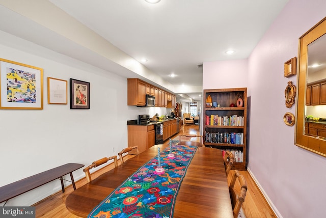 dining room featuring dark hardwood / wood-style flooring