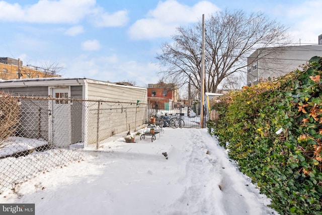 view of yard covered in snow