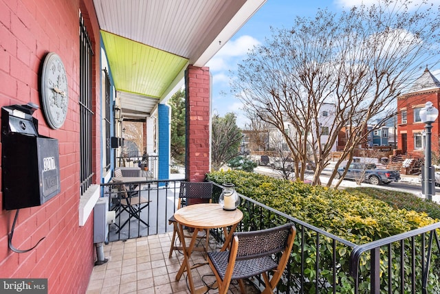 balcony featuring a porch