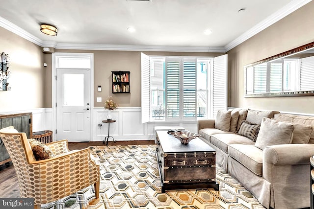 living room featuring crown molding and light hardwood / wood-style flooring