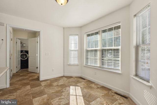 spare room featuring washer / clothes dryer