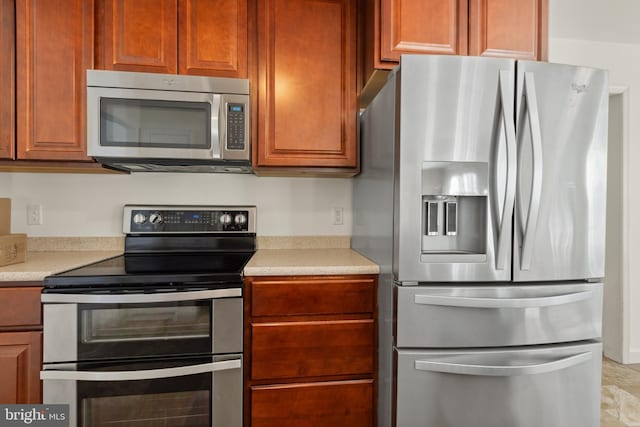 kitchen with appliances with stainless steel finishes