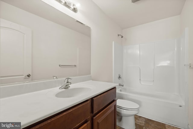 full bathroom featuring vanity, toilet, and shower / washtub combination