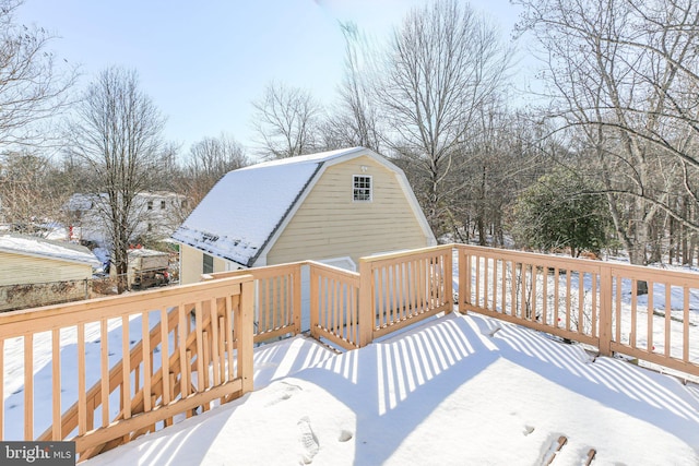 view of snow covered deck