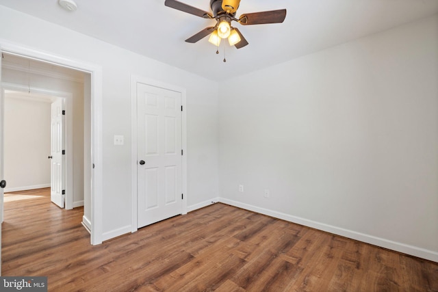 interior space featuring ceiling fan and wood-type flooring