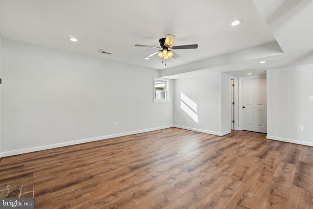 unfurnished room with ceiling fan and wood-type flooring