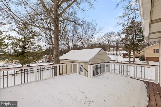 view of snow covered deck