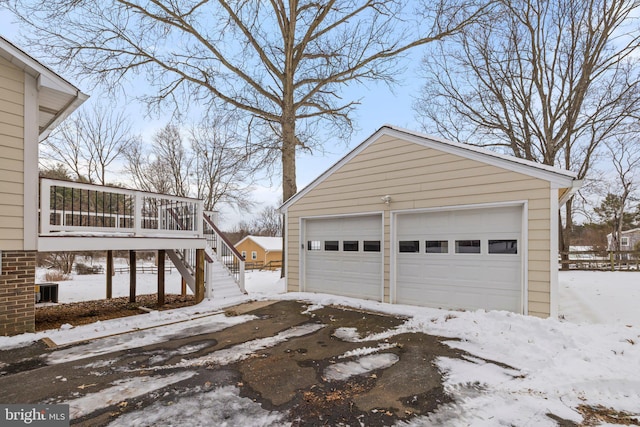 view of snow covered garage