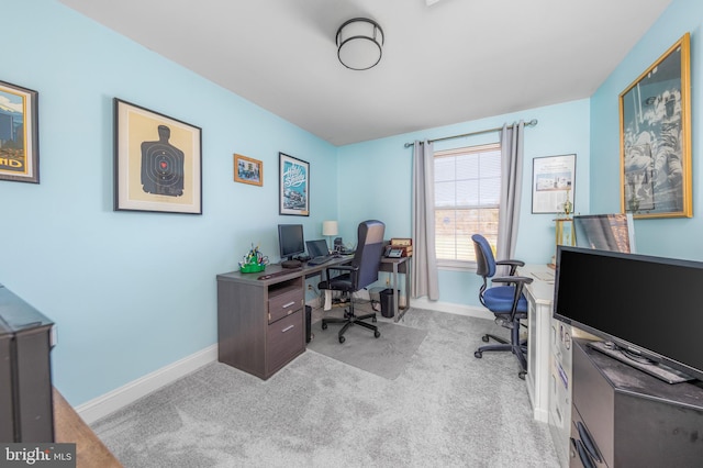 office area featuring light colored carpet