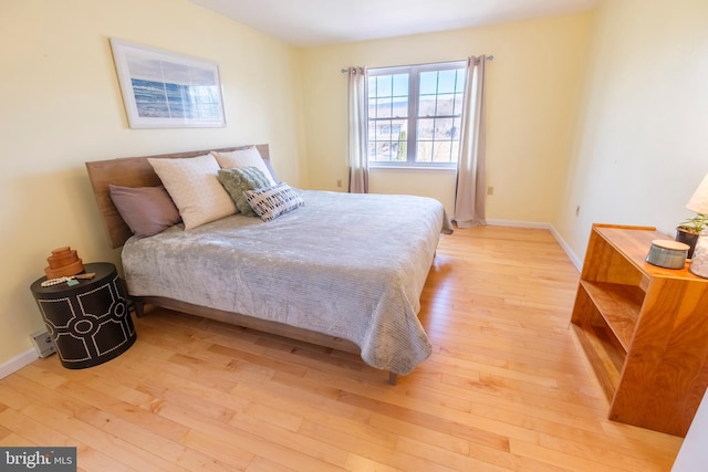 bedroom featuring light wood-type flooring