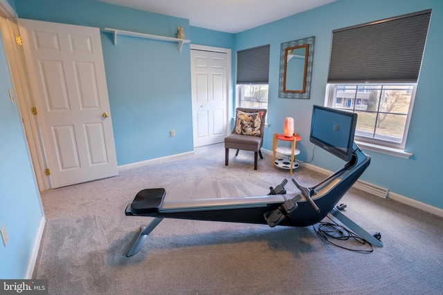 exercise room with carpet flooring