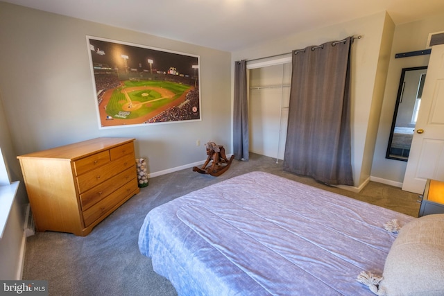 carpeted bedroom featuring a closet