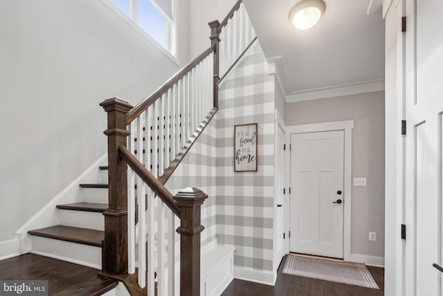 stairway featuring hardwood / wood-style flooring and ornamental molding