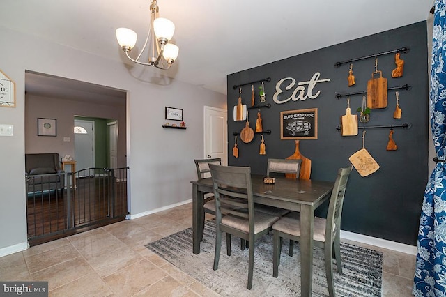 dining area with a chandelier