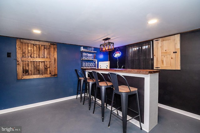 bar with decorative light fixtures