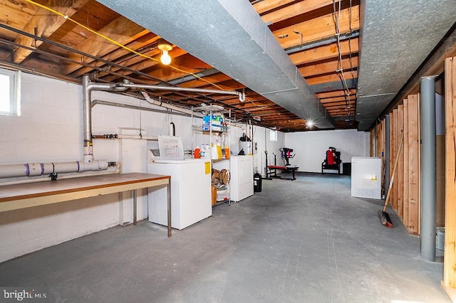 basement featuring separate washer and dryer