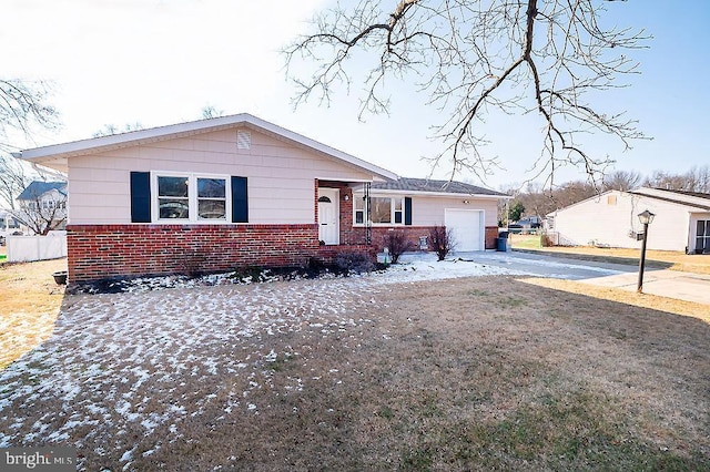 ranch-style home featuring a garage