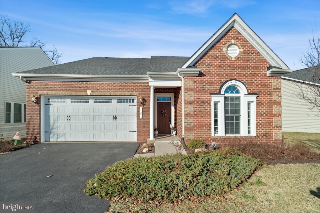 front of property with a garage