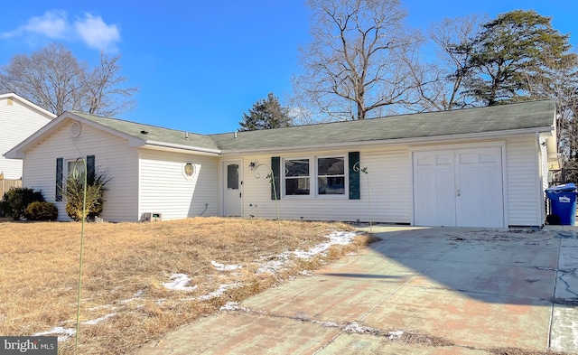 single story home featuring a garage