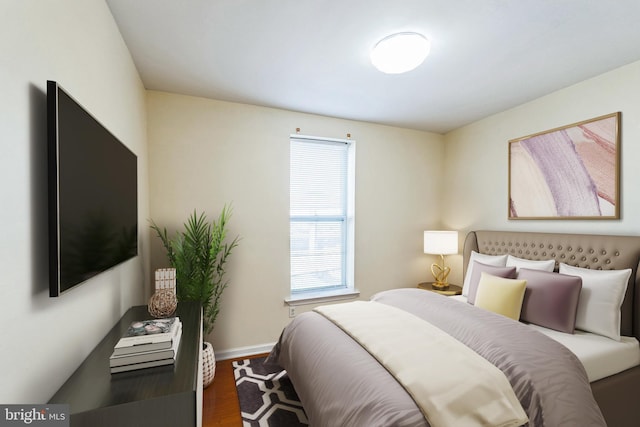 bedroom featuring dark hardwood / wood-style floors