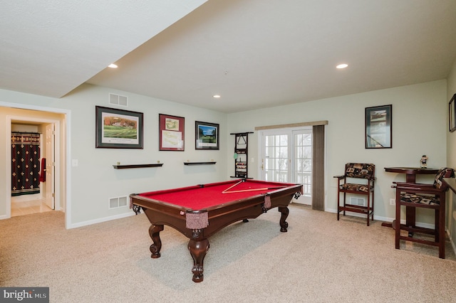 game room with pool table and light carpet