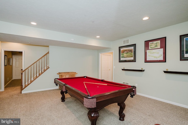 rec room with billiards, a textured ceiling, and carpet floors