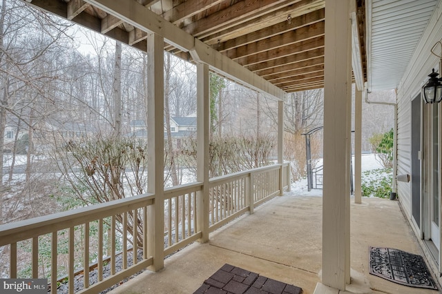 view of snow covered patio