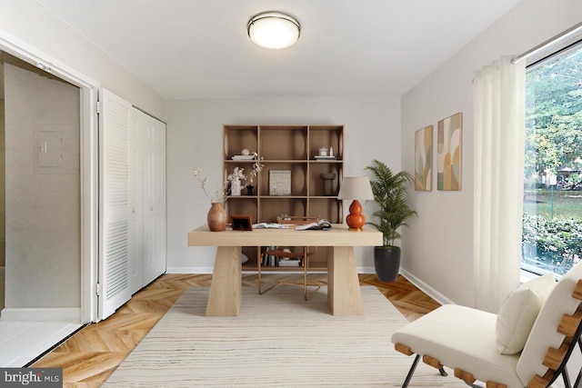 office area with parquet floors