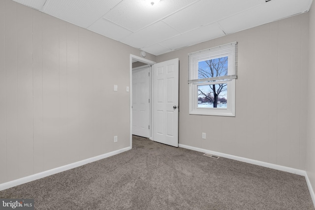 unfurnished bedroom featuring carpet