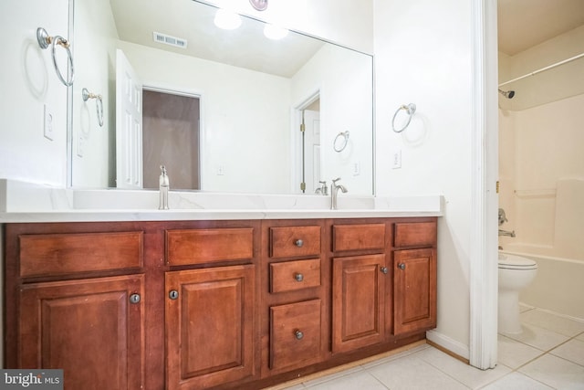 full bathroom with vanity, toilet, shower / washtub combination, and tile patterned flooring