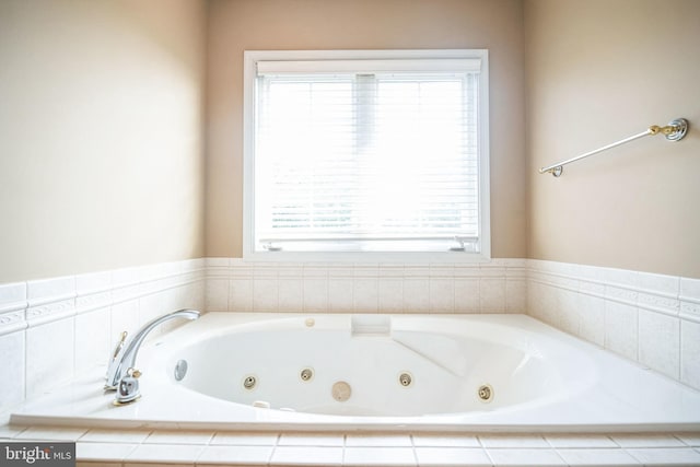 bathroom with tiled tub