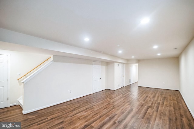 basement featuring dark wood-type flooring