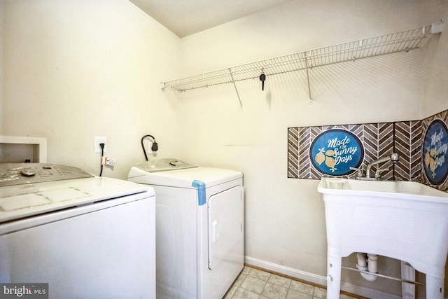 washroom with washer and clothes dryer