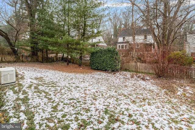 view of yard covered in snow