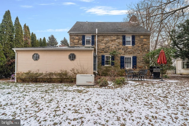 view of snow covered property