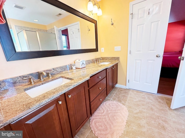 full bath featuring a shower stall, visible vents, a sink, and tile patterned floors