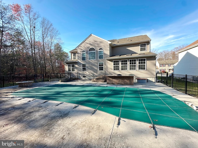 view of pool featuring a fenced in pool, entry steps, a patio area, and fence