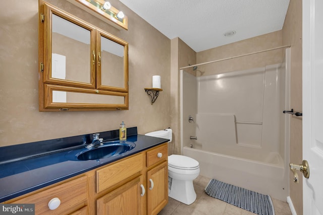 full bathroom featuring tile patterned flooring,  shower combination, toilet, a textured ceiling, and vanity