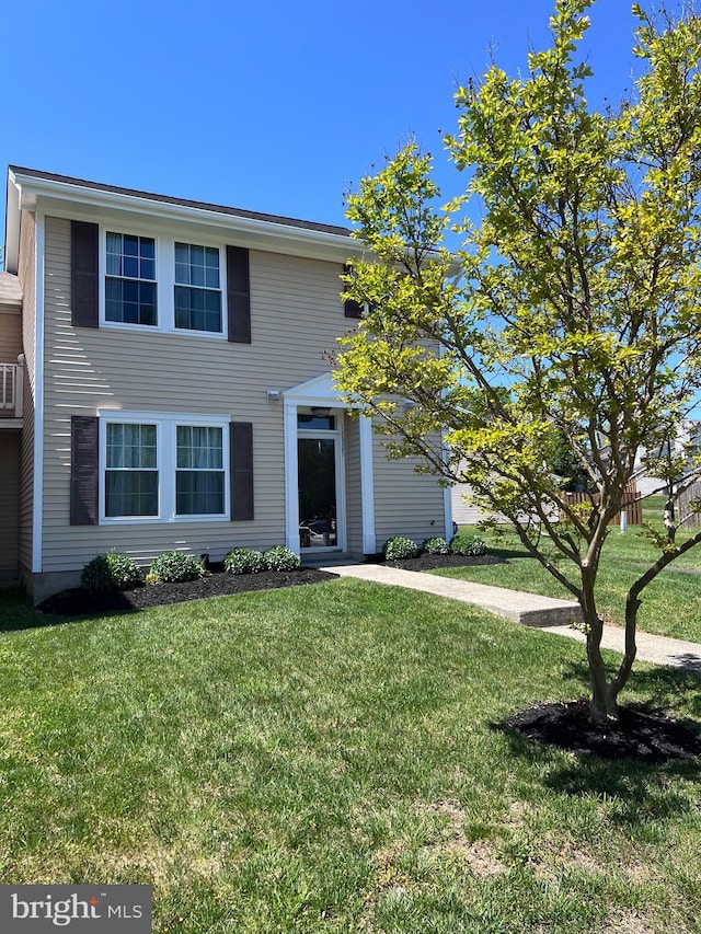 view of front of property with a front yard