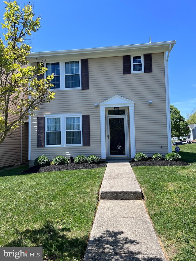 view of front of house with a front lawn