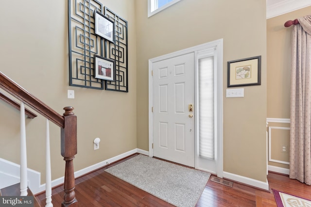 entrance foyer featuring hardwood / wood-style flooring